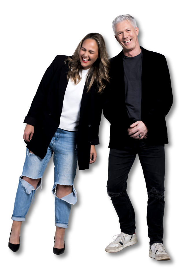 Two people stand together smiling, relaxed and happy. The woman wears a black blazer, white shirt, ripped jeans, and heels; the man sports a black jacket, dark shirt, black jeans, and white sneakers—both are human map creators. | Humanico Workforce Intelligence Software